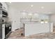 A modern kitchen island featuring granite countertops and stainless steel appliances at 814 S Midway Hwy., Johnsonville, SC 29555