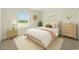 Stylish staged bedroom featuring coordinating furniture, bright natural light, and neutral decor for a welcoming space at 820 S Midway Hwy., Johnsonville, SC 29555