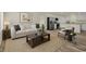 Inviting living room with comfortable seating and a view into the eat-in kitchen at 820 S Midway Hwy., Johnsonville, SC 29555