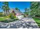 Charming home with a well-manicured lawn, mature trees, and an attached garage at 8261 Timber Ridge Rd., Conway, SC 29526