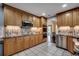 Bright kitchen featuring updated appliances, custom cabinets, and stylish backsplash at 8261 Timber Ridge Rd., Conway, SC 29526