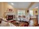 Bright living room with fireplace, comfortable seating, and an open layout perfect for entertaining at 8261 Timber Ridge Rd., Conway, SC 29526