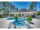 Backyard featuring a pool and jacuzzi tub with a large deck at 8261 Timber Ridge Rd., Conway, SC 29526