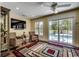 Cozy sitting area with access to the pool, comfortable seating, and a serene atmosphere at 8261 Timber Ridge Rd., Conway, SC 29526