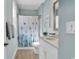 Cozy bathroom with a shower-tub combo and a classic white vanity at 8418 Cape Dutch Loop, Myrtle Beach, SC 29572