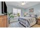 Comfortable bedroom with a large window and a soft color palette at 8418 Cape Dutch Loop, Myrtle Beach, SC 29572