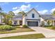 Beautiful white brick home with a well-manicured lawn and a two-car garage at 8418 Cape Dutch Loop, Myrtle Beach, SC 29572