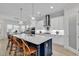 Gourmet kitchen featuring a large center island, pendant lighting, and stainless steel appliances at 8418 Cape Dutch Loop, Myrtle Beach, SC 29572