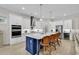 Modern kitchen features a large island with counter seating and stainless steel appliances at 8418 Cape Dutch Loop, Myrtle Beach, SC 29572