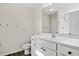 Clean and well-lit bathroom featuring a white vanity, toilet, and walk-in shower at 875 Owls Nest Dr., Conway, SC 29527