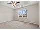 Bright bedroom with tray ceiling, fan, and large window for natural light and views at 875 Owls Nest Dr., Conway, SC 29527