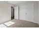 Bedroom features a closet and a doorway leading to another room at 875 Owls Nest Dr., Conway, SC 29527