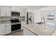 Modern kitchen featuring stainless steel appliances, granite countertops and ample cabinet space at 875 Owls Nest Dr., Conway, SC 29527