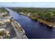 Scenic aerial shot of a waterfront community with docks and boats along a tranquil river at 915 Cedarwood Circle, Myrtle Beach, SC 29572