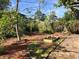 Backyard garden featuring a brick pathway with raised garden bed at 915 Cedarwood Circle, Myrtle Beach, SC 29572