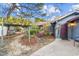 Charming home with landscaped front yard, pergola, and a quaint walkway at 915 Cedarwood Circle, Myrtle Beach, SC 29572