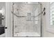 Bright bathroom featuring a glass shower door and elegant tiling at 1006 Surf Pointe Dr., North Myrtle Beach, SC 29582