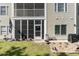 Serene backyard with a patio, landscaping, and an inviting outdoor seating area for relaxation and entertaining at 101 Maddington Place Dr. # 103, Surfside Beach, SC 29575