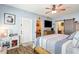 Inviting bedroom features wood-look floors, lots of storage, and modern decor at 101 Maddington Place Dr. # 103, Surfside Beach, SC 29575