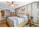 Comfortable bedroom with stylish decor, wood-look floors, and plenty of natural light at 101 Maddington Place Dr. # 103, Surfside Beach, SC 29575