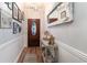 Inviting entryway featuring wood floors, stylish decor, and plenty of natural light at 101 Maddington Place Dr. # 103, Surfside Beach, SC 29575