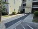 Exterior view of a multi-Gathering residential building, showcasing its architecture and proximity to landscaping at 101 Maddington Place Dr. # 103, Surfside Beach, SC 29575