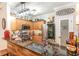 Stylish kitchen boasts granite countertops, stainless steel appliances, and unique light fixtures at 101 Maddington Place Dr. # 103, Surfside Beach, SC 29575