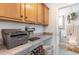 Convenient office nook with custom cabinets and granite countertop located just outside the main bathroom at 101 Maddington Place Dr. # 103, Surfside Beach, SC 29575