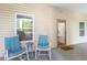 Comfortable front porch with rocking chairs offering a cozy spot to relax at 101 Maddington Place Dr. # 103, Surfside Beach, SC 29575