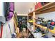 Ample storage in this storage room with shelves and hanging storage options at 101 Maddington Place Dr. # 103, Surfside Beach, SC 29575