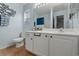 Bright bathroom with light blue walls, vanity, and updated fixtures at 1064 Penny Ln. # 1064, Myrtle Beach, SC 29577