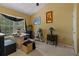 Bright bedroom featuring a ceiling fan, a desk by the window, and neutral carpeting at 1064 Penny Ln. # 1064, Myrtle Beach, SC 29577