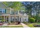 Charming townhome with brick accents, blue shutters, and a well-maintained front yard at 1064 Penny Ln. # 1064, Myrtle Beach, SC 29577
