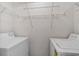 Functional laundry room with washer, dryer, and shelving at 1064 Penny Ln. # 1064, Myrtle Beach, SC 29577