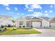 Charming single-story home with a well-manicured lawn and a one-car garage in a quiet neighborhood at 1239 Pyxie Moss Dr., Little River, SC 29566