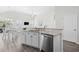 Bright and open kitchen featuring granite countertops, stainless steel appliances, and ample cabinet space at 1239 Pyxie Moss Dr., Little River, SC 29566