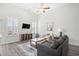 Comfortable living room with a ceiling fan and stylish furnishings at 1239 Pyxie Moss Dr., Little River, SC 29566