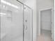 Modern shower stall with glass enclosure and built-in shelving at 1239 Pyxie Moss Dr., Little River, SC 29566