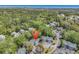 Beautiful aerial shot of condos nestled in a lush forest, with the ocean visible in the distance at 157 Egret Run Ln. # 514, Pawleys Island, SC 29585