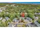 Breathtaking aerial shot of condos amidst a lush forest, with the stunning ocean horizon in the background at 157 Egret Run Ln. # 514, Pawleys Island, SC 29585