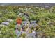 An aerial view shows a condo community nestled in a lush landscape, with a pool and marsh views at 157 Egret Run Ln. # 514, Pawleys Island, SC 29585