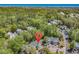 Scenic aerial view of a condo surrounded by lush trees, near a picturesque coastline and ocean at 157 Egret Run Ln. # 514, Pawleys Island, SC 29585
