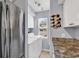 Functional laundry area with washer, dryer, and convenient access to the kitchen and stainless steel refrigerator at 157 Egret Run Ln. # 514, Pawleys Island, SC 29585