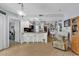 Inviting living space with bar seating, open to kitchen, and comfortable armchair in view at 157 Egret Run Ln. # 514, Pawleys Island, SC 29585