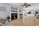Well-lit living area featuring an open layout, fireplace, and seamless flow to the kitchen at 157 Egret Run Ln. # 514, Pawleys Island, SC 29585