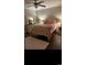 Cozy bedroom with pink bedding, dresser with mirror and rug creates a comfortable and inviting space at 161 Penn Circle, Galivants Ferry, SC 29544