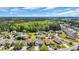 Aerial view of a community with well-maintained homes and mature trees at 174 Seville Dr., Murrells Inlet, SC 29576