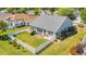 Aerial view of a home with a fenced-in yard, patio, and well-manicured lawn at 174 Seville Dr., Murrells Inlet, SC 29576