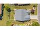 Overhead shot of a home featuring a fenced yard, patio, landscaping, and a gray roof at 174 Seville Dr., Murrells Inlet, SC 29576