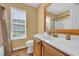 Bathroom with single vanity and a framed mirror at 174 Seville Dr., Murrells Inlet, SC 29576